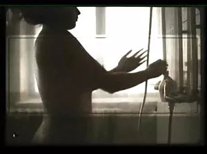 Peeping behind nude personalities on a large nudist beach