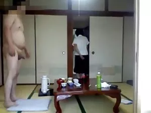 Thin blonde with small breasts fingering at the mirror