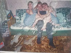 Blonde teen gets greedy with two guys on the couch