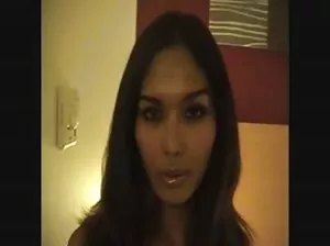 Adult women relax on the beach with their children