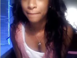 Slim girl posing with black guy and undressing naked