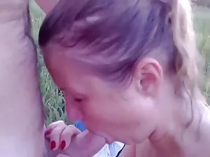 Two muscular girlfriends have fun with the ostrich