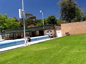 Pumped gay swims in the pool naked and then posing and fingering dick