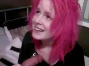 Granny with red hair is smacking her young friend