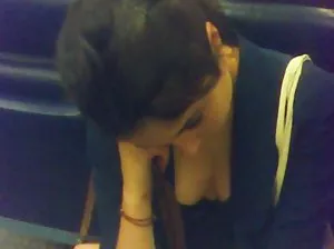 Young Devaha sunbathes naked on a wild beach