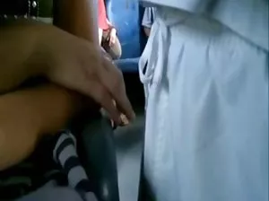 A bodybuilder in a superhero costume mocks a weak man