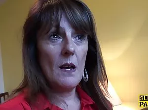 Two blonde lesbians caress each other with tongues