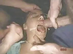 Gay guy crouched on a red-haired couch to masturbate