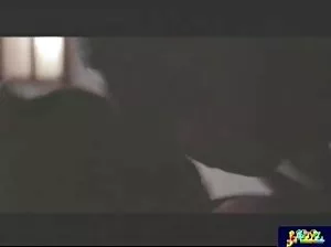 Charming pregnant young woman gently playing with her writing