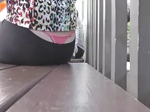 Daring tattooed girl with round breasts inserts a dildo in pussy